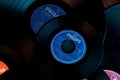 Frankfurt, Germany - April 2021: close-up of black vinyl record of Philips recording studio, color lighting, analog retro music