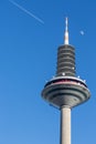 Frankfurt, Germany - February 21, 2021 - Europaturm or tower of europe with blue sky, plane, moon in Frankfurt, Germany