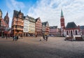 Romerberg Square with Old St. Nicholas Church and colorful Half-timbered buildings - Frankfurt, Germany