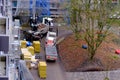 Frankfurt, Germany - January 2022: workers repairing house, lifting materials for insulation facades with crane, concept of