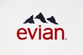 Evian mineral water logo on a wall