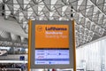 Lufthansa airline boarding counter sign in Frankfurt International Airport in Germany Royalty Free Stock Photo