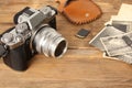 FRANKFURT, GERMANY - JUNE 2020: FUJIFILM XT4 with Fujinon lens, vintage photographs on old wood background, photographic concept,