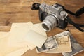 FRANKFURT, GERMANY - JUNE 2020: FUJIFILM XT4 with Fujinon lens, vintage photographs on old wood background, photographic concept,