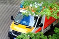 Frankfurt, Germany - June 2021: modern white ambulance car with flashing lights on roof at top is waiting for the patient, medics