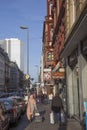 Street view of Munich street in Frankfurt with people at street corner Moselle street with skyscraper