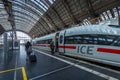 A passenger is rushing to the High-speed train Royalty Free Stock Photo