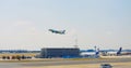 Frankfurt, Germany - May 2, 2023: plane takes off at Frankfurt city airport on runway. Beautiful view of riding cars at Royalty Free Stock Photo