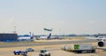 Frankfurt, Germany - May 2, 2023: plane takes off at Frankfurt city airport on runway. Beautiful view of riding cars at Royalty Free Stock Photo