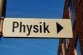 A signpost on the university campus shows the way to the Department of Physics