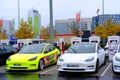 Frankfurt, Germany, October 2021: many Tesla light electric cars replenish battery at charging station, alternative energy