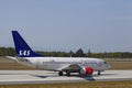 Frankfurt International Airport - Boeing 737 of SAS lands Royalty Free Stock Photo