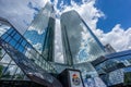 Skyscraper buildings scenery. Cristal cloud reflections from Deutsche Bank headquarters building complex