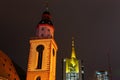 Tops of St. Catherine`s Church and Commerzbank Tower in Frankfurt, Germany, at night