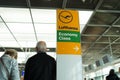 Frankfurt am Main, Germany - October 11, 2015: Lufthansa airlines logo icon, economy class and direction pointer sign. Airport inf