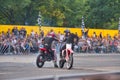 FRANKFURT AM MAIN, GERMANY - SEPT 2022: 2 stuntmen riding Honda CRF 450R, Monster Truck auto show Royalty Free Stock Photo