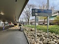 Frankfurt am Main, Germany - 07.11.2023: Terminal signage and sightseeing tour. A yellow bus Royalty Free Stock Photo