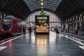 Frankfurt am Main, Hesse Germany - Travellers walking to a waiting local train on the platform in the main