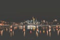 Sunset over the river Main in Frankfurt. View of the skyline with a bridge in the foreground. Cityscape at night