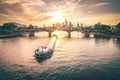 Sunset over the river Main in Frankfurt. View of the skyline with a bridge in the foreground. Cityscape with container ship