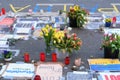 Frankfurt - March 2022: memorial day for the dead, flowers lie on ground, mourning candles burning for dead, an anti-war rally