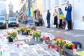 Frankfurt - March 2022: memorial day for the dead, flowers lie on ground, mourning candles burning for dead, an anti-war rally