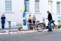 Frankfurt - March 2022: people support Ukraine, flowers lie on ground, mourning candles burning for dead, an anti-war rally near