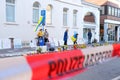 Frankfurt - March 2022: people support Ukraine, flowers lie on ground, mourning candles burning for dead, an anti-war rally near