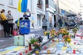 Frankfurt - March 2022: people support Ukraine, flowers lie on ground, mourning candles burning for dead, an anti-war rally near