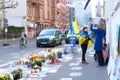 Frankfurt - March 2022: people support Ukraine, flowers lie on ground, mourning candles burning for dead, an anti-war rally near