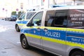 Frankfurt - March 2022: typical german police cars on streets of germany, frankfurt am main law enforcement officers guarding