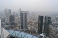 Frankfurt panoramic city view from skyscraper during overcast weather. Frankfurt under the fog.