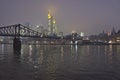 Frankfurt, Snowy night city view by the river Rhein, Germany, Europe