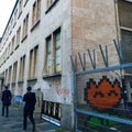 A Frankfurt street, with graffiti and businessmen