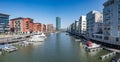 Frankfurt Westhafen with modern architecture, small harbor and residential buildings