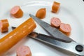 Frankfurter sausage cut with scissors