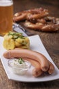 Frankfurter sausages on rustic wood Royalty Free Stock Photo