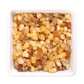 Frankincense, small pieces of aromatic hardened resin, in a white bowl