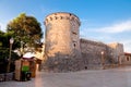 Frankopan fortress tower walls and little wooden shop at Krk - C Royalty Free Stock Photo