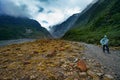 Franz josef glacier new zealand - september3,2015 : tourist walk Royalty Free Stock Photo