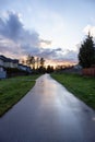 Path in the Residential Neighborhood during a colorful spring season Royalty Free Stock Photo