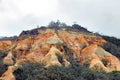 Fraser Island coloured sands, sandy cliffs in orange, red, brown and yellow colors Royalty Free Stock Photo