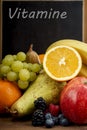 Frash Fruit, Orange, apple, banana, pear, grapes against blackboard Royalty Free Stock Photo