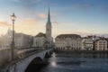 Fraumunster Church and Munsterbrucke Bridge at sunset - Zurich, Switzerland