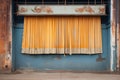 frayed, heavy stage curtains hanging from a rusted rail