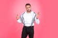 Freak guy. Portrait of funny funky crazy man with suspenders feel surprised face expression shout wear fun look outfit Royalty Free Stock Photo