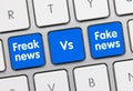 Freak news VS Fake news - Inscription on Blue Keyboard Key