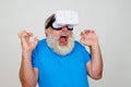 Freaked out bearded man in 3D virtual reality glasses Royalty Free Stock Photo