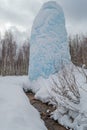 Freaks of nature. Huge icicle formed around a source of artesian