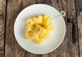 Frech Pineapple sliced on white dish